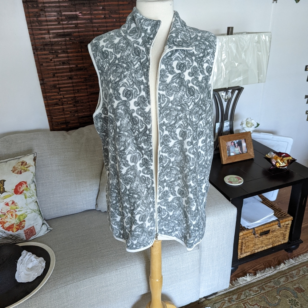 Laura Scott.  Vest.    A142